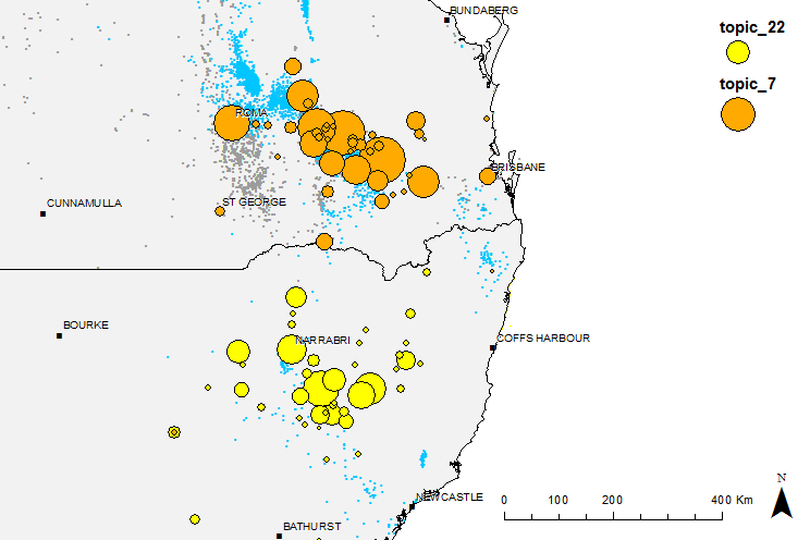 Two LDA geotopics corresponding with the gas fields and communities of the Surat Basin (orange) and Liverpool (yellow). Small blue dots are CSG wells, while grey dots are conventional petroleum wells.